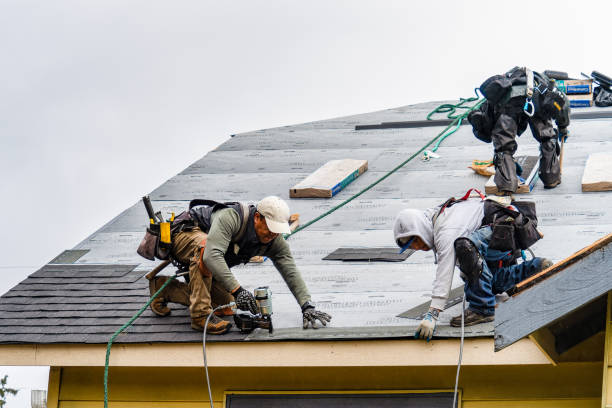 Professional Roofing technician working in New Durham, NH